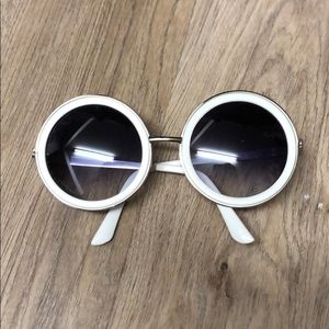 White circular sunglasses